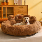 A dog lying on a fluffy brown Bear Paw Pet Sofa Bed in a cozy room.