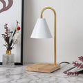 Table lamp with white shade and wooden base on a marble surface, with measurements displayed.