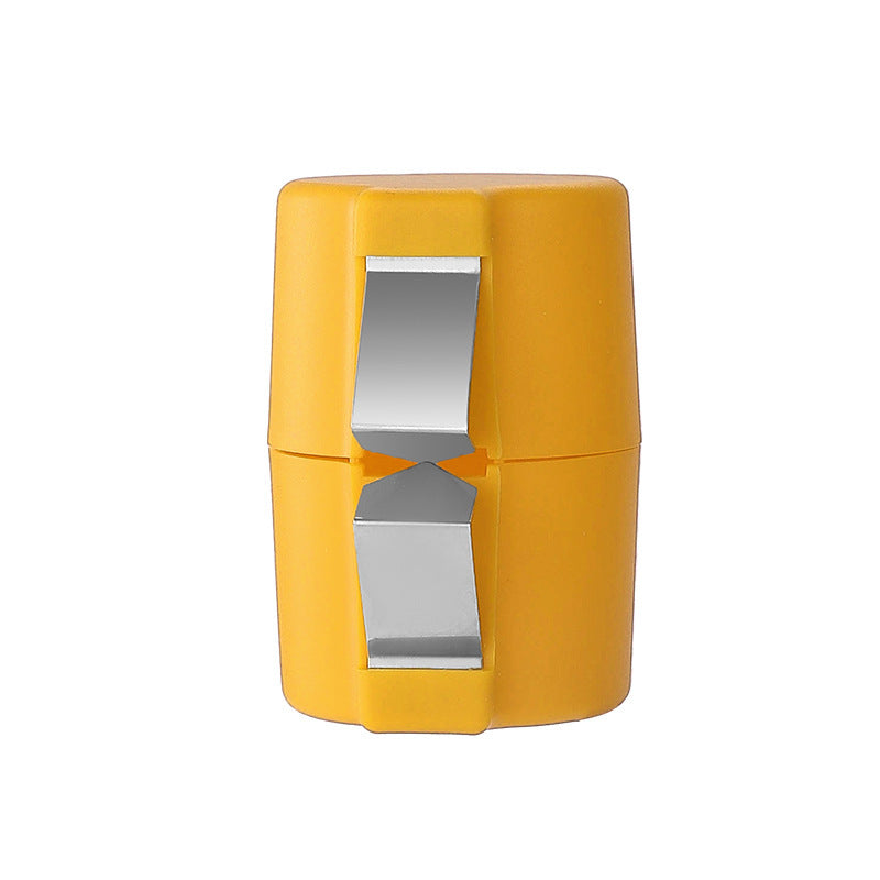 Yellow and silver eggshell opener on a white background