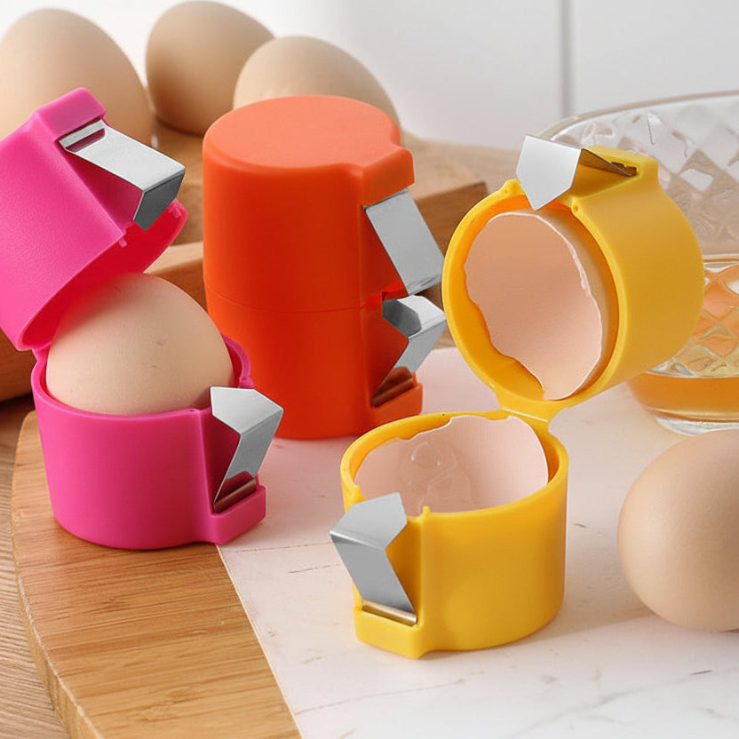 Three colorful egg shell removers on a wooden surface with eggs.