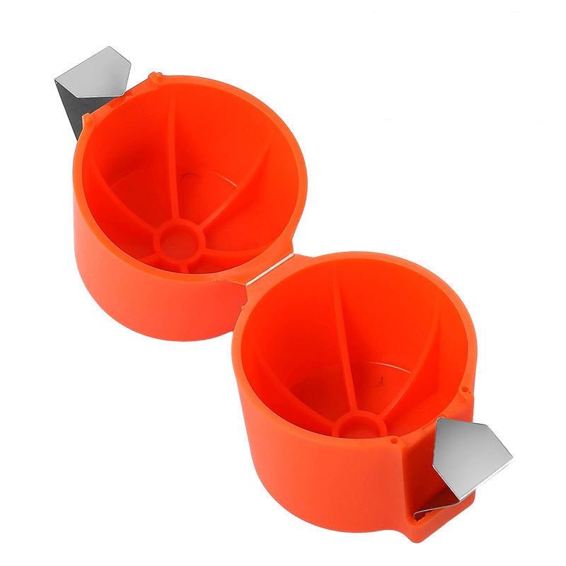 Orange plastic egg holders with metal clips on a white background